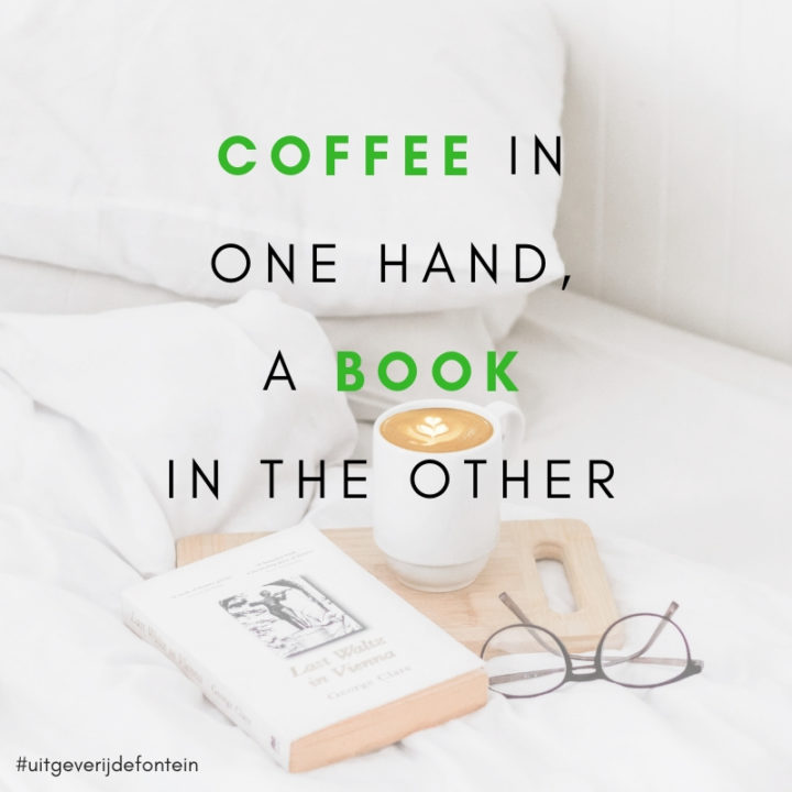 Coffee in one hand, a book in the other